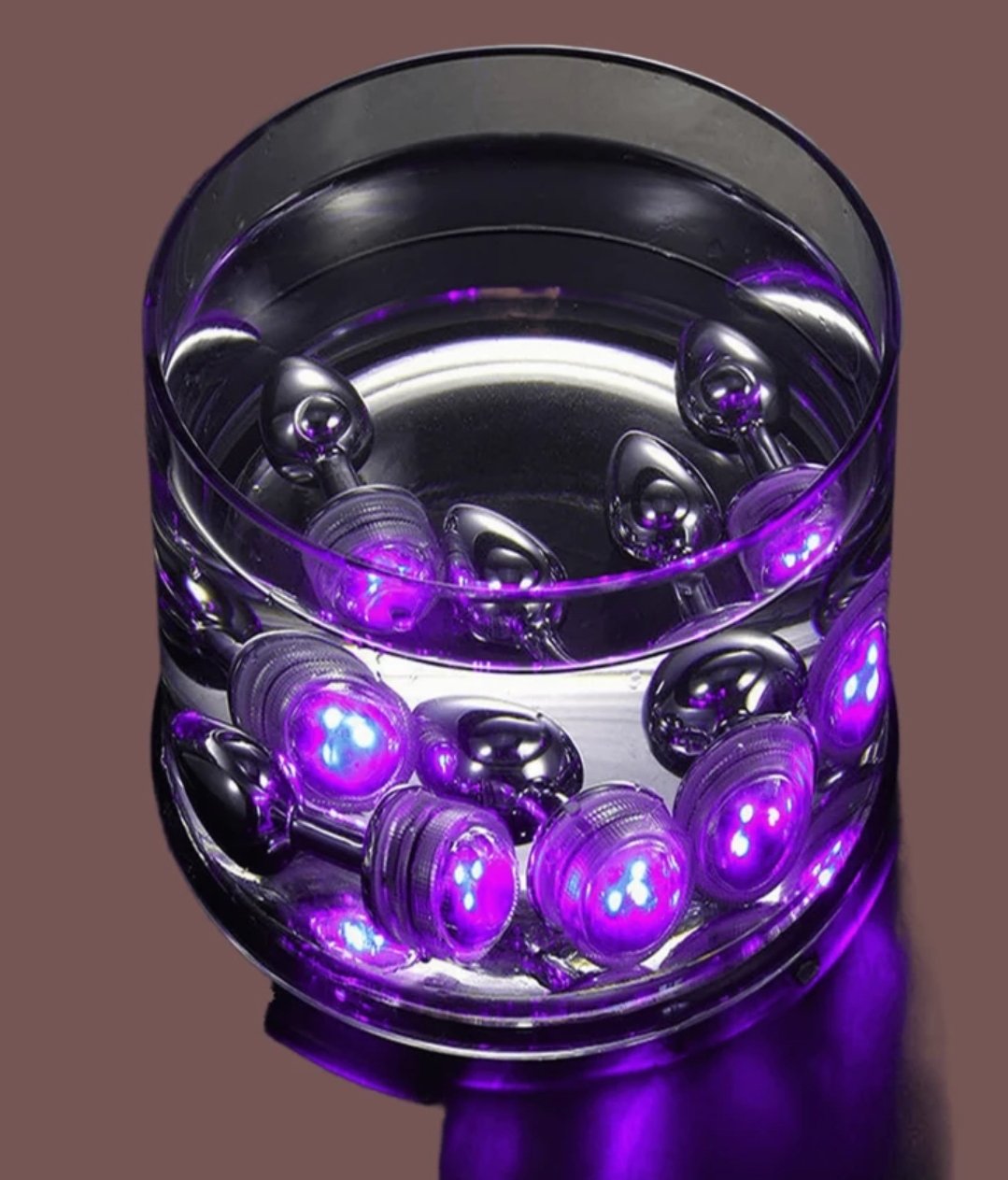 Anal Plug de Lujo "Glow & Pulse" – Ilumina tu Placer 💡✨🍑